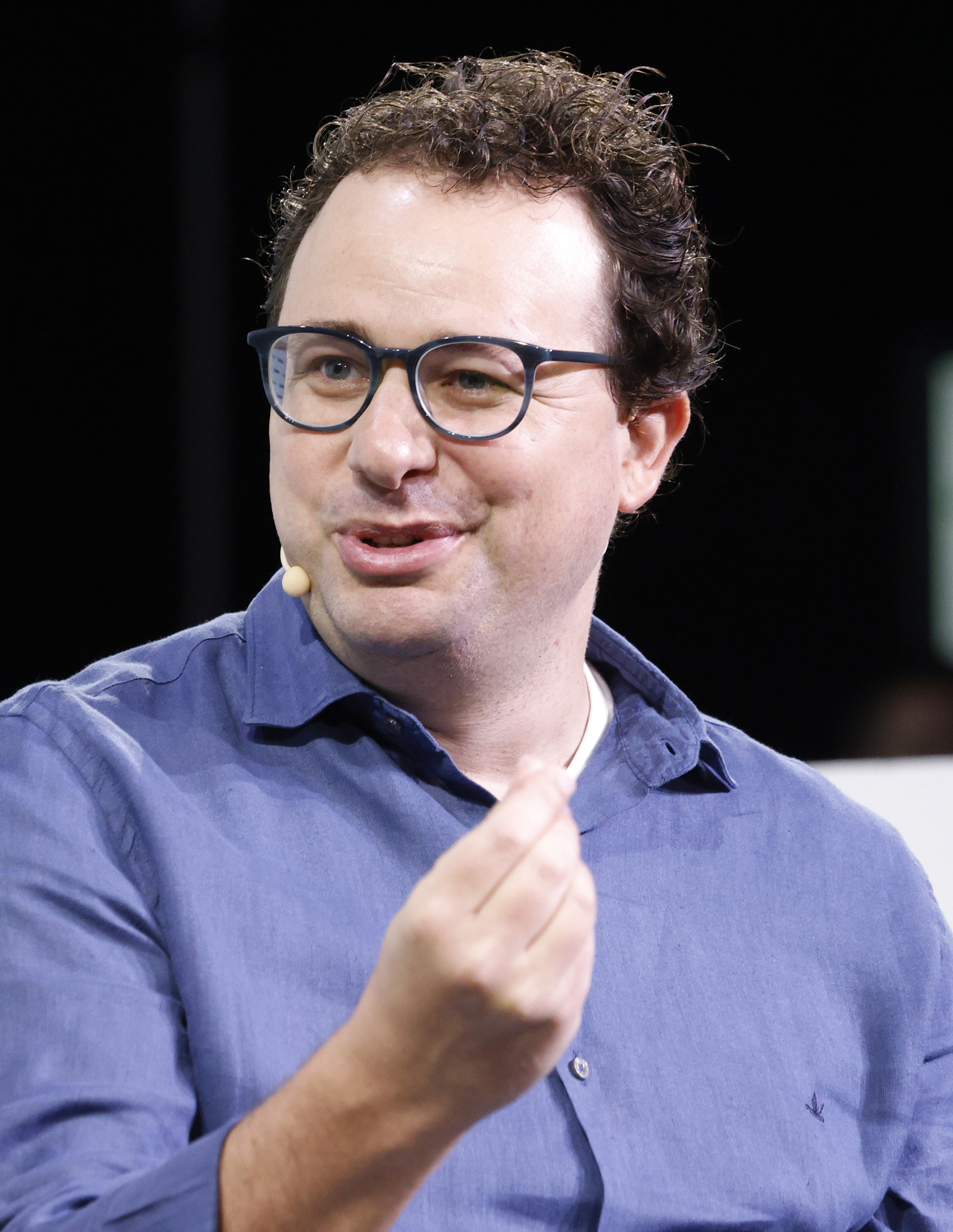 Dario Amodei, co-founder and CEO of Anthropic, speaking on stage at TechCrunch Disrupt 2023