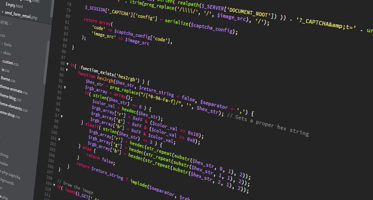 Code on a dark screen in a code editor (stock photo)