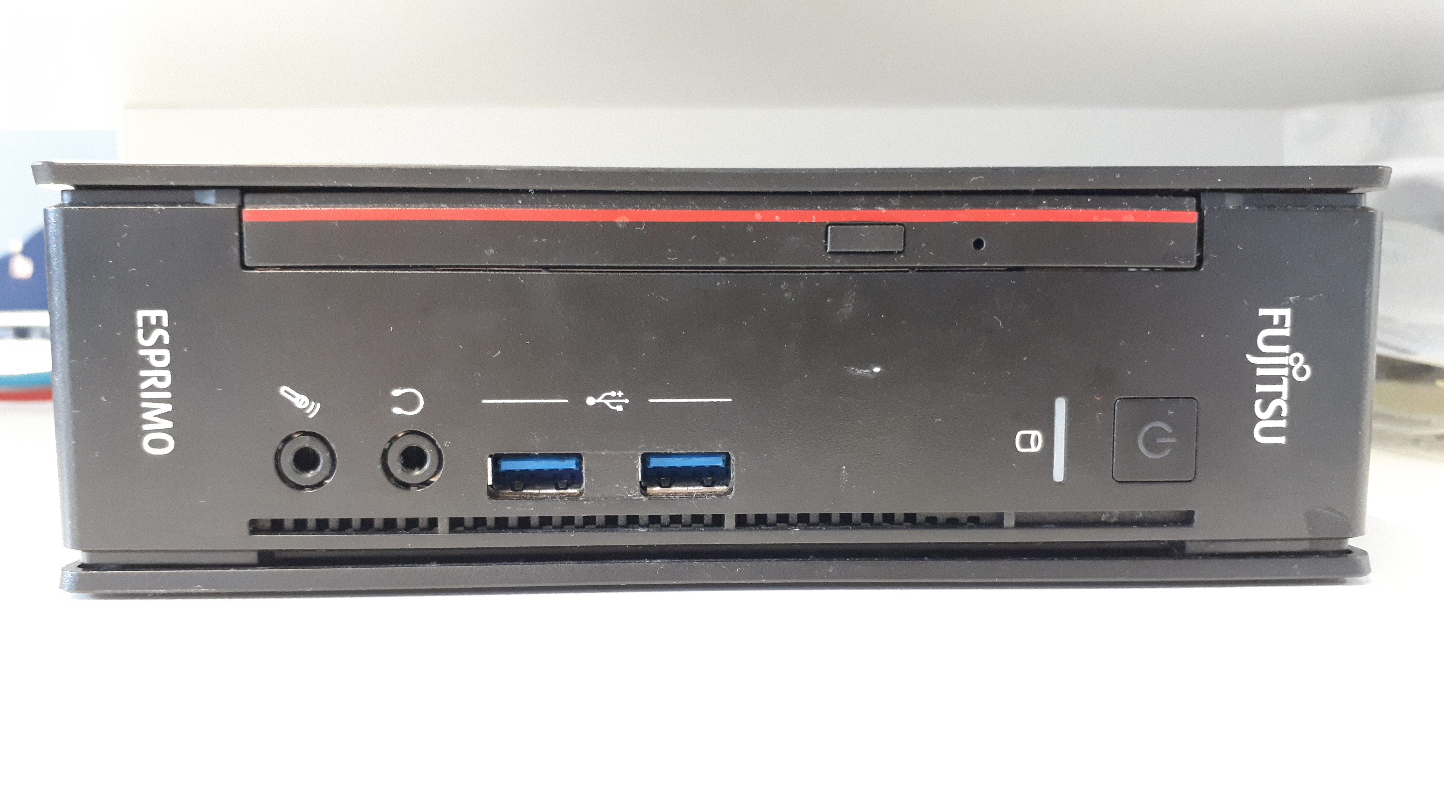 Compact mini PC on a desk (illustrative photo)