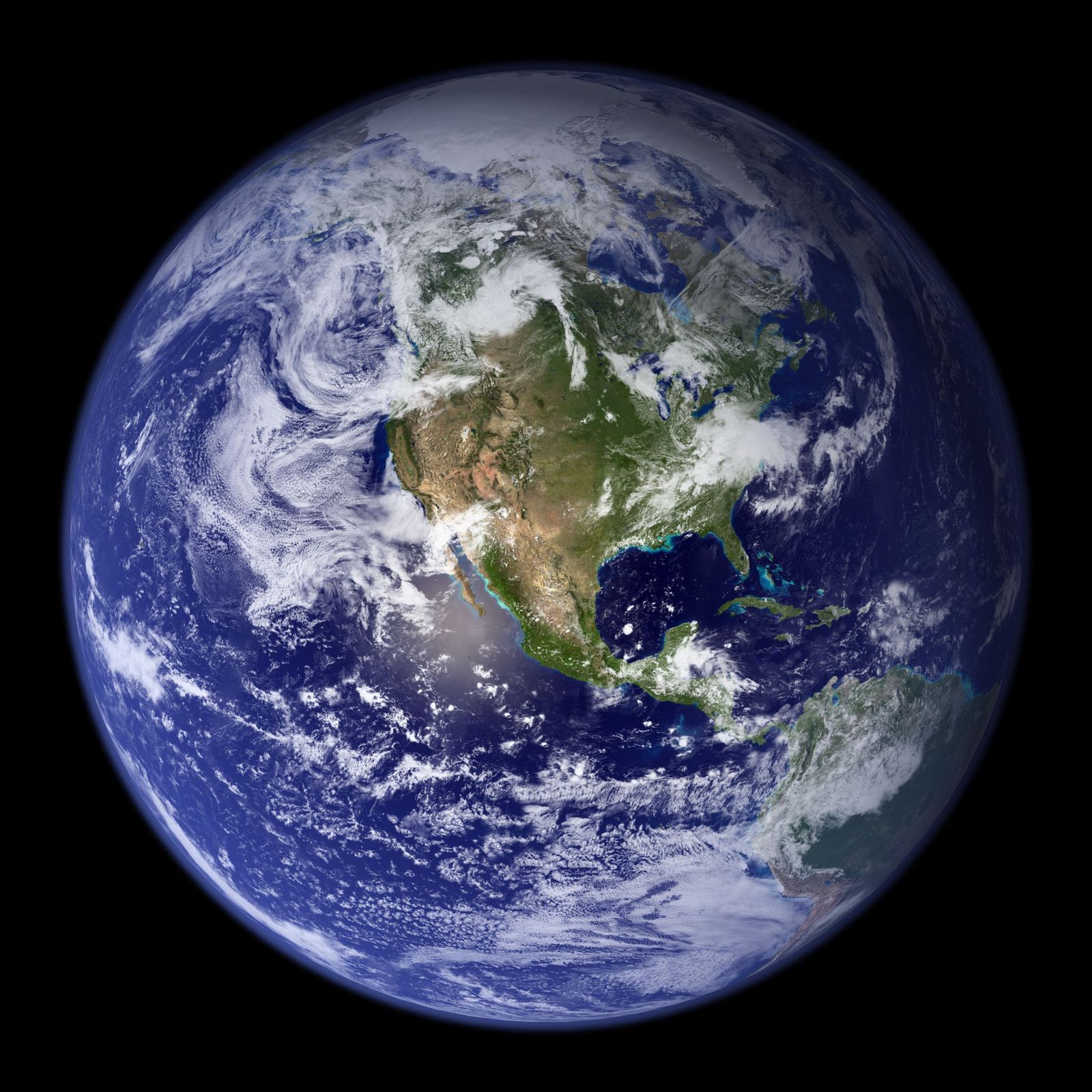 Earth seen from space, blue oceans and continents against black sky
