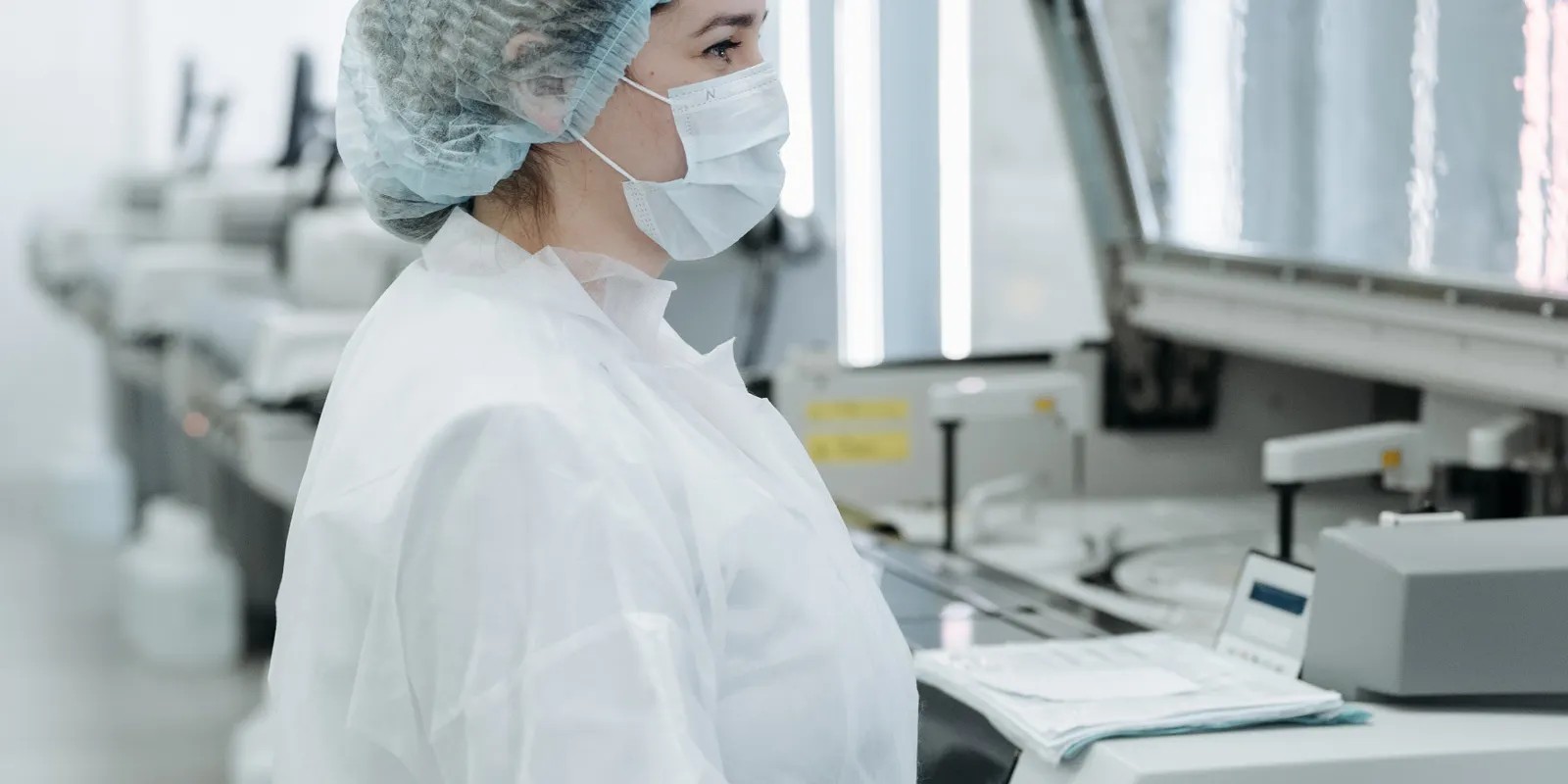 Scientist working with advanced equipment in a modern laboratory